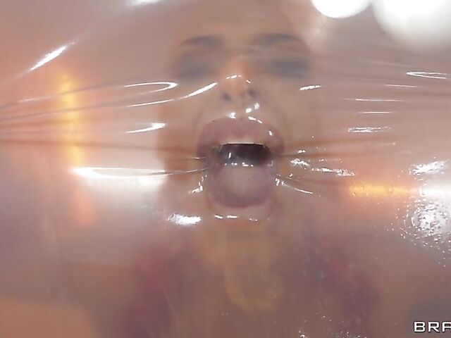 MILF Phoenix Marie anal fucked through a latex sheet