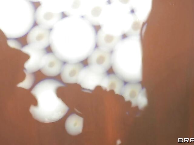 MILF Phoenix Marie anal fucked through a latex sheet