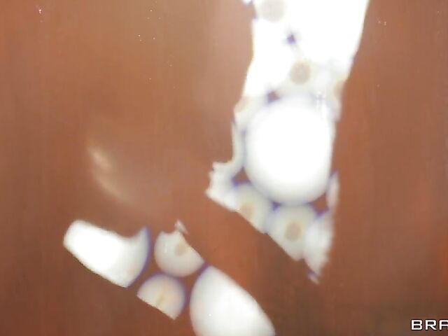 MILF Phoenix Marie anal fucked through a latex sheet