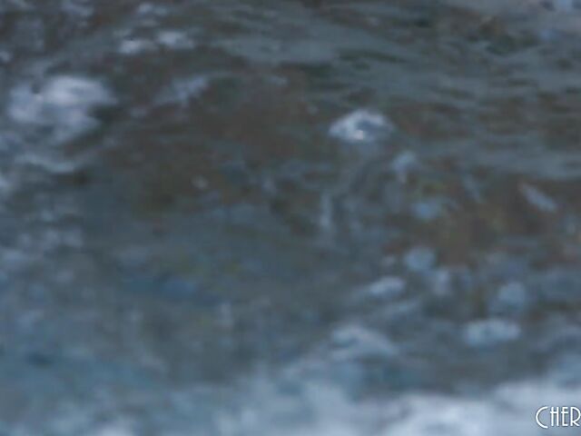 Big tits bikini blonde Savannah Bond shows off her goods and fucks her dildo in a jacuzzi