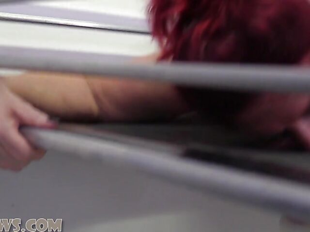 Ball gagged big breasted mature slave Manuela face down on the milking table