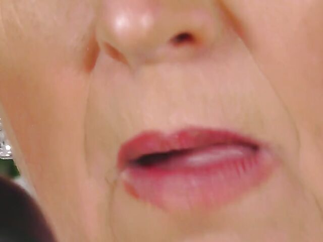 Short hair mature Marika fucks herself with a cucumber