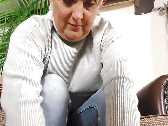 Short hair mature Marika fucks herself with a cucumber