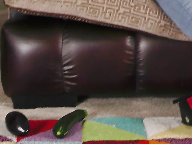 Short hair mature Marika fucks herself with a cucumber