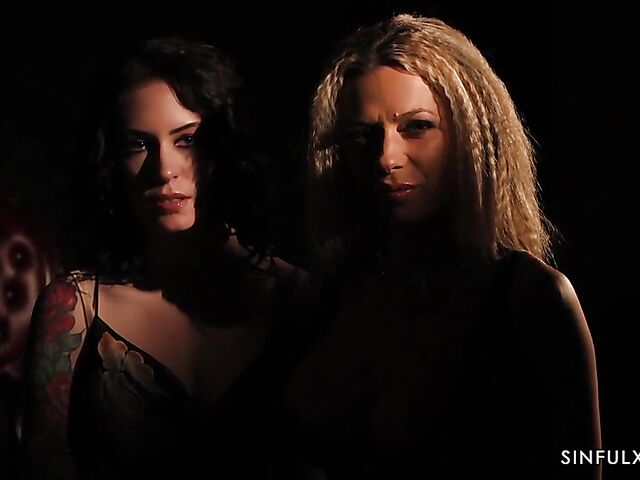 Submissive lesbian Anna de Ville eats Shalina Devine's pussy in the dark