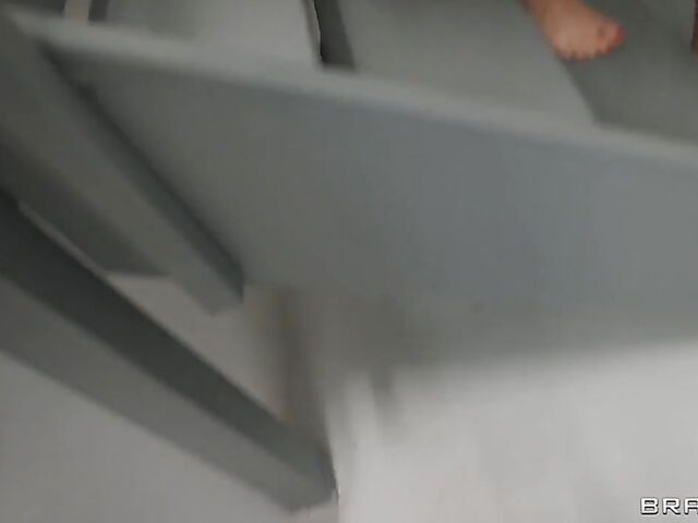 Well-endowed blonde MILF Mellanie Monroe gets horny on the stairs