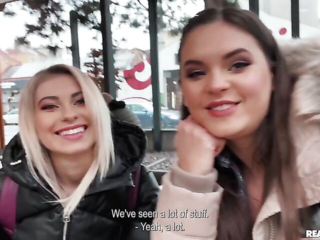 Busty lesbian Taylee Wood sharing a double ended dildo with Lilly Bella