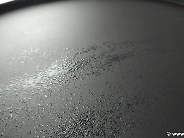 Sophia's lactating tits while ironing at home