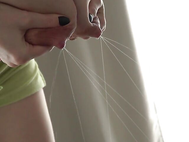 Sophia's lactating tits while ironing at home