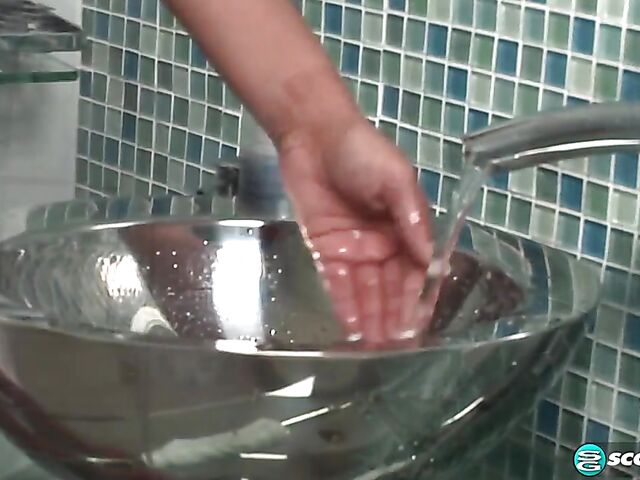 Black MILF Cream shaving pussy and masturbating in the bathroom