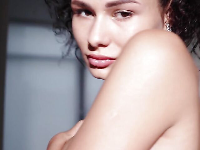 Playboy erotic solo with Layla Balan stripping nude in the doorway