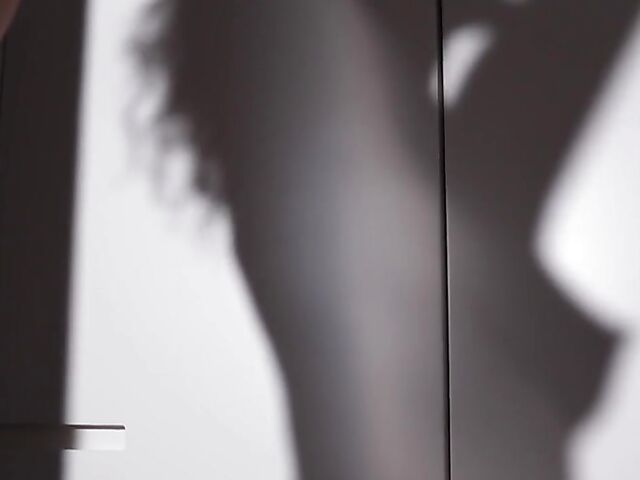 Playboy erotic solo with Layla Balan stripping nude in the doorway