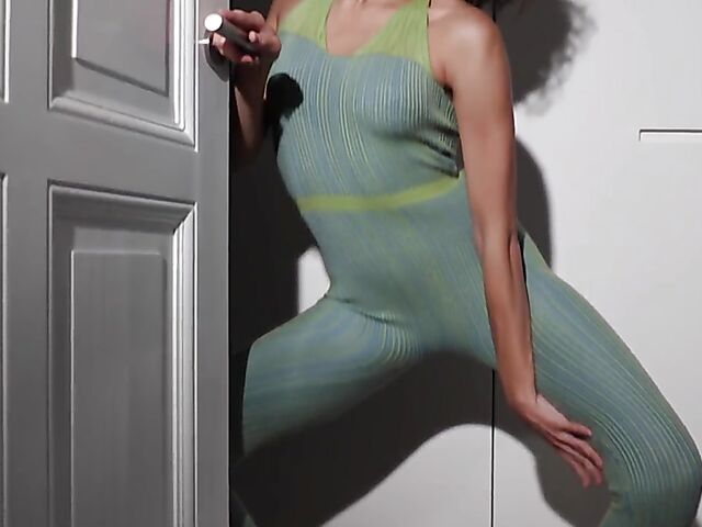 Playboy erotic solo with Layla Balan stripping nude in the doorway