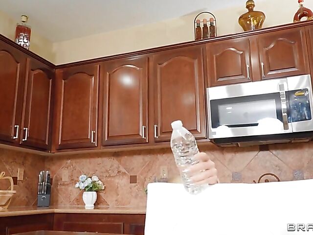 Plumber bangs big tits MILF Savannah Bond in the middle of the kitchen