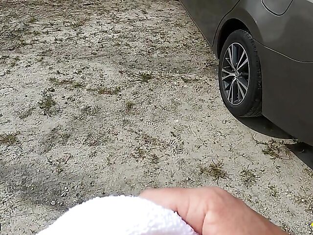 Young redhead Harper Red is naked in the car and needs help