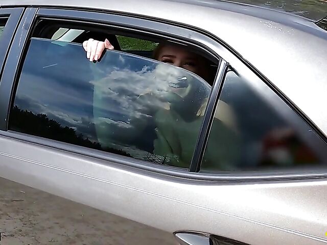 Young redhead Harper Red is naked in the car and needs help