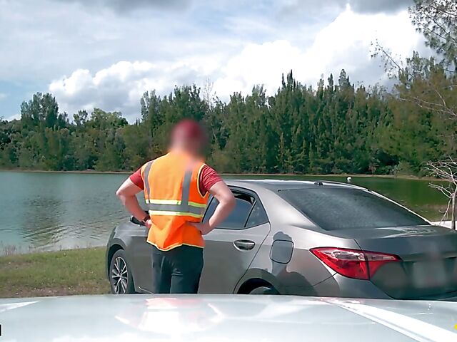 Young redhead Harper Red is naked in the car and needs help