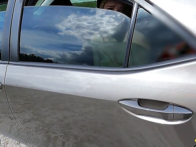 Young redhead Harper Red is naked in the car and needs help