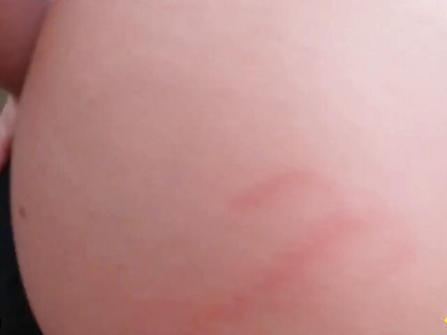 Young redhead Harper Red is naked in the car and needs help