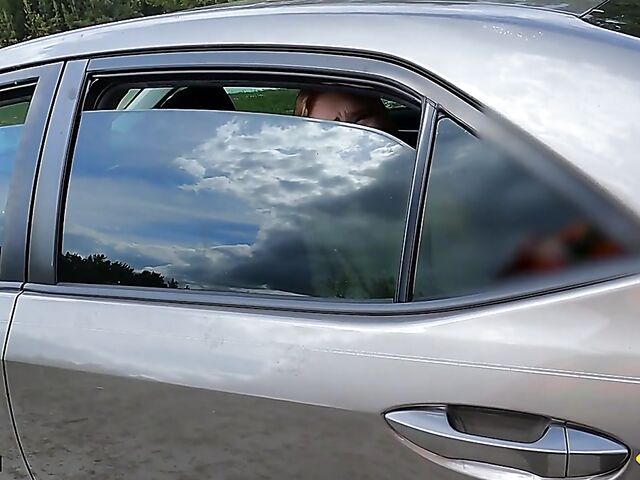 Young redhead Harper Red is naked in the car and needs help