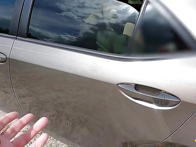 Young redhead Harper Red is naked in the car and needs help