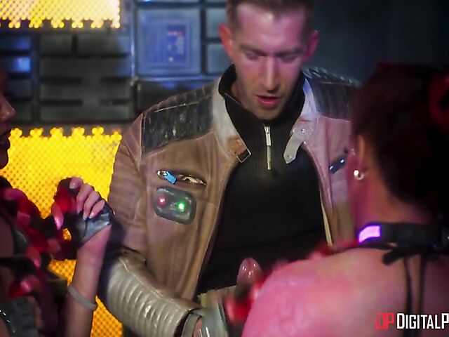 Emily Woods and Ruby Sims stroke Danny D's big pipe and fuck a double ended dildo in the space