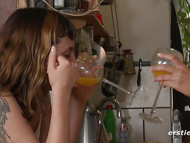 Real lesbians Rink and Becky drink juice and eat pussy in the kitchen