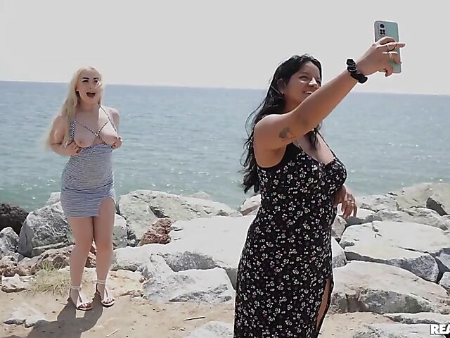 Lesbian beach girls Mary Rock and Lisi Kitty do it in the sun