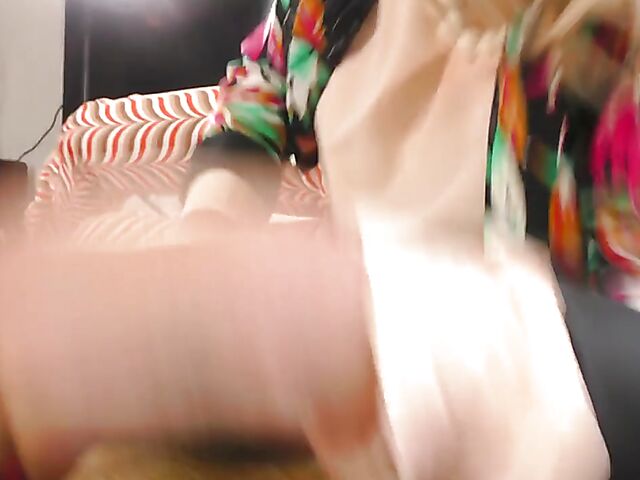 Shaved mature woman with glasses gets naked on the floor and pleasures herself