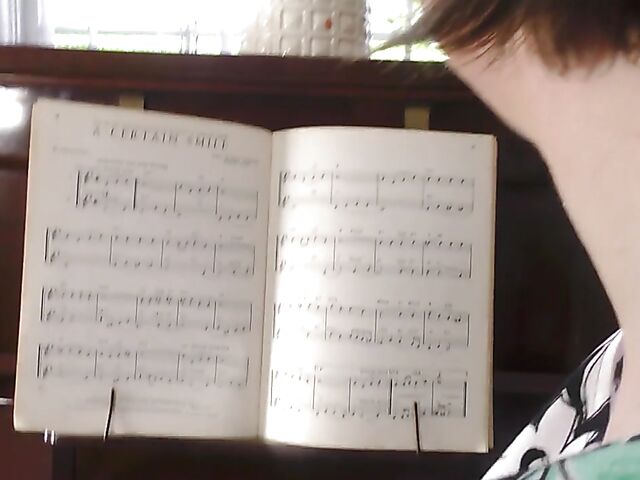 Busty mom Cashmere playing piano and toying her pussy