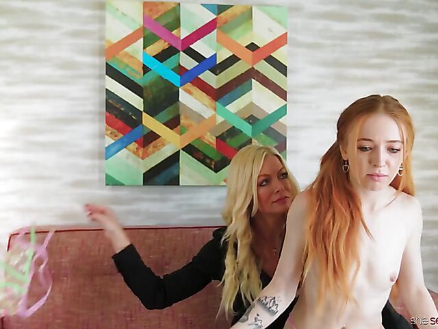 Teen lesbian redhead Madi Collins gets seduced by milf Serene Siren