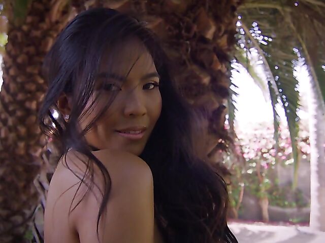 Asian bikini babe Jada Kai gets nude under the palm tree