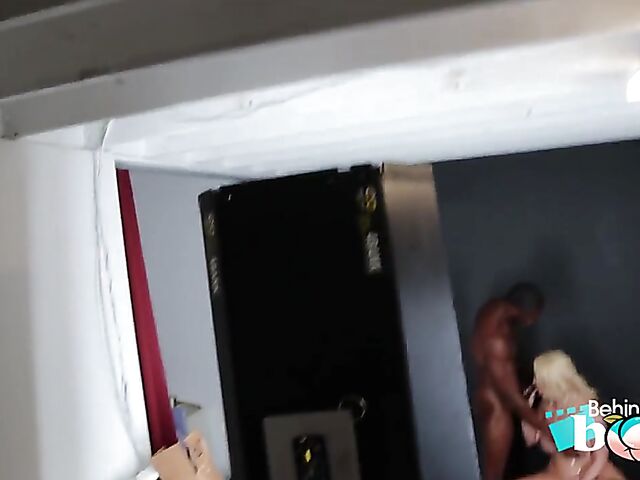 Porn backstage with big ass blonde Kate Dee shaking her booty and doing interracial doggystyle