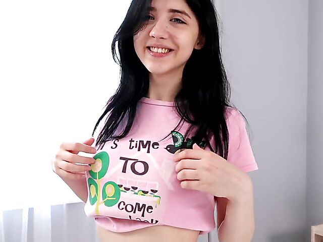 Dark-haired teen Emili Heads loves her black dildo