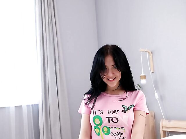 Dark-haired teen Emili Heads loves her black dildo