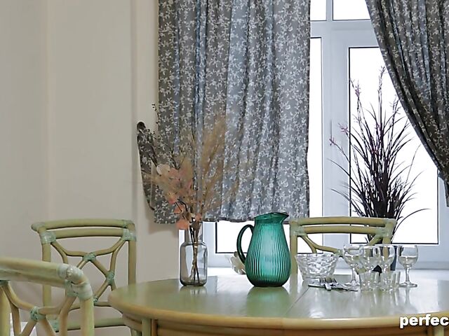 Skinny teen Dina B masturbates in the kitchen