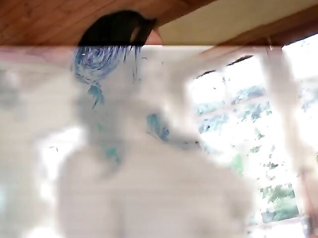 Busty brunette Sarah Randall uncovers her massive boobs