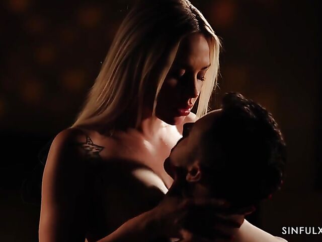 Erotic sex in the dark of the bedroom with blonde-haired Angie Lynx