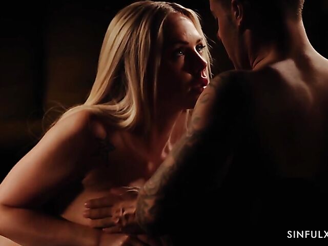 Erotic sex in the dark of the bedroom with blonde-haired Angie Lynx