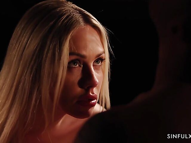 Erotic sex in the dark of the bedroom with blonde-haired Angie Lynx