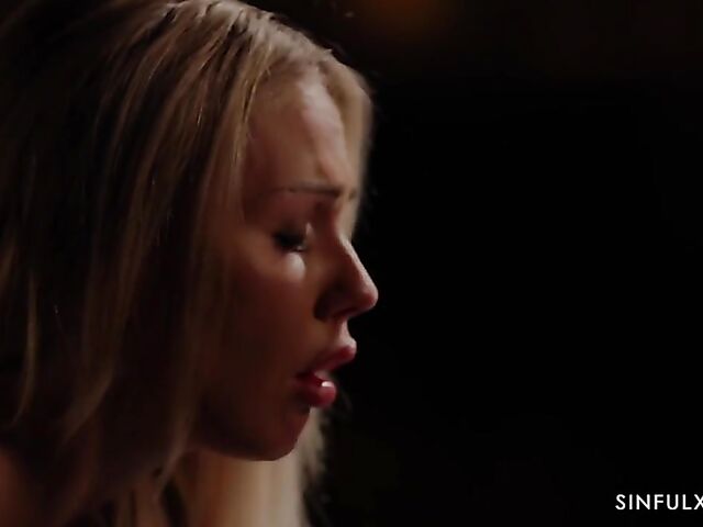 Erotic sex in the dark of the bedroom with blonde-haired Angie Lynx