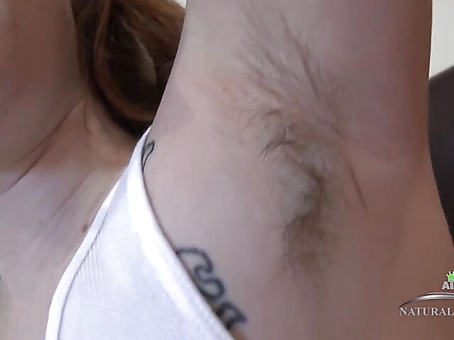 Hairy girl Lily Lay shows her bush and armpits during the interview