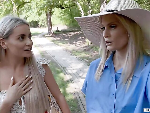 Candee Licious & Emilly Bellex - Lesbians use a double ended dildo outdoors