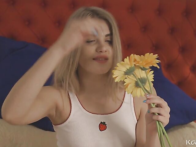 Naughty solo girl with a flower Kata D fingers herself in her bed