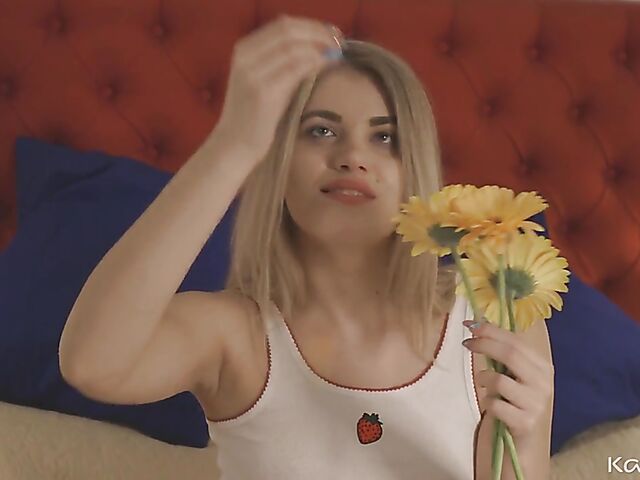 Naughty solo girl with a flower Kata D fingers herself in her bed