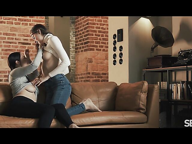 Passionate lesbian lovers Foxy Alissa and Antonia Sainz make out on the couch