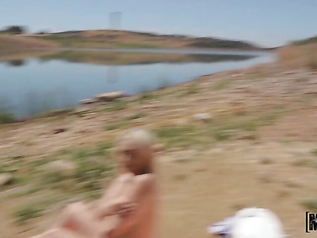 Point-of-view outdoor sex by the lake with natural tits blonde Lisi Kitty