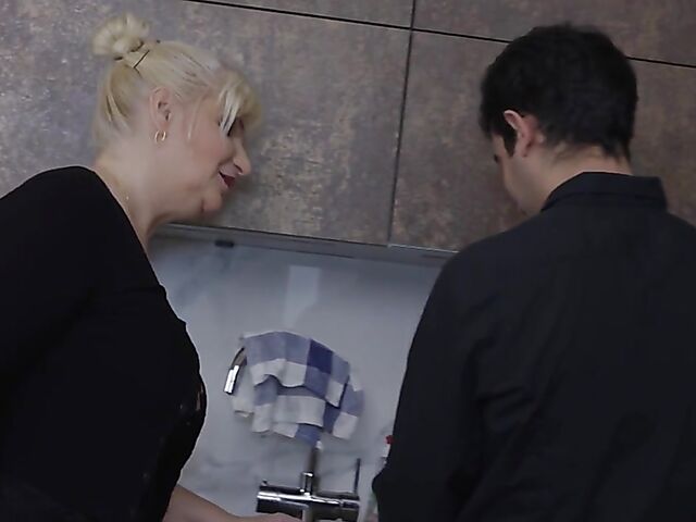 Horny mature blonde Yazmine gets pounded in the middle of the kitchen