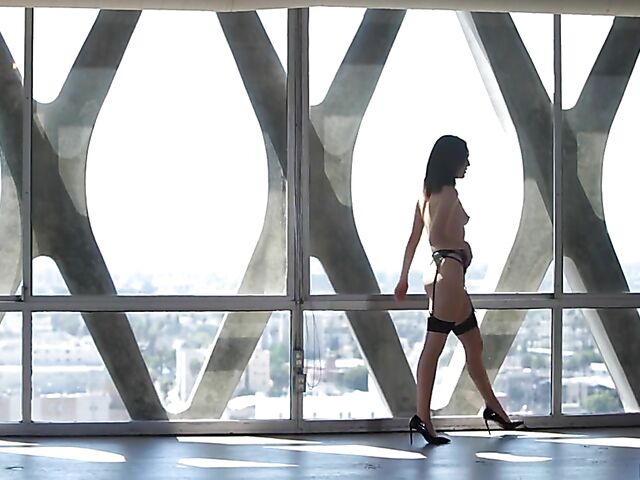 Freya Parker posing in her sexy lingerie and fucking in the empty room with a view