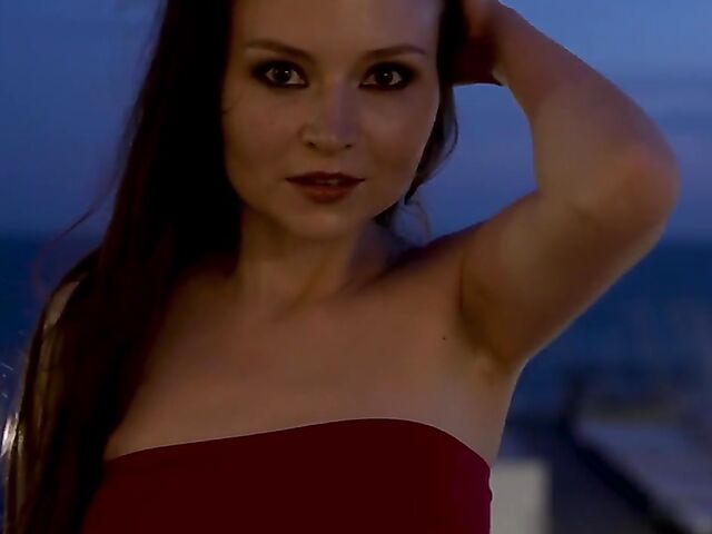 Sexy solo in a red mini dress featuring Berenice